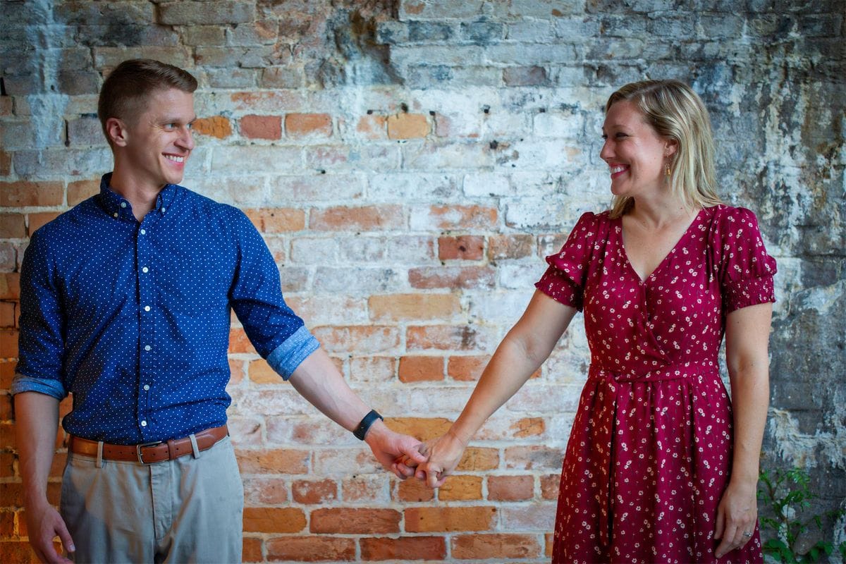 Kevin and Christine holding hands